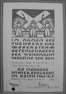 Verleihungsurkunde HE 8